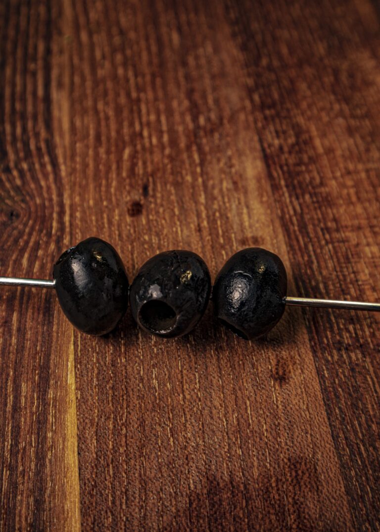 Step 5: Garnish with black olives