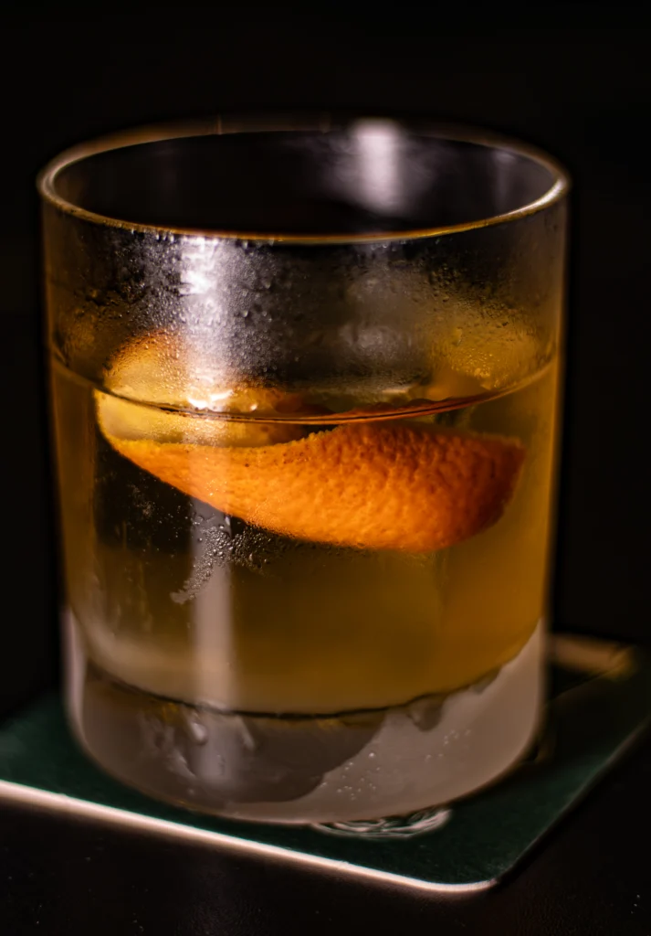 Picture of Clarified Old Fashioned cocktail in the Hideaway bar